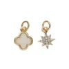 2 gullfargede anheng / charms, stjerne med strass Ø9 mm, blomst hvitt sentrum Ø10 mm