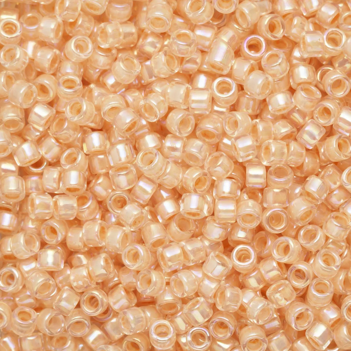 TOHO-perler 11/0 – aprikos rainbow, 794 IC rainbow crystal/apricot-lined