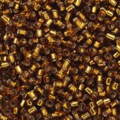 TOHO-perler 11/0 – brun silverline, 34 Silver-lined smoky topaz