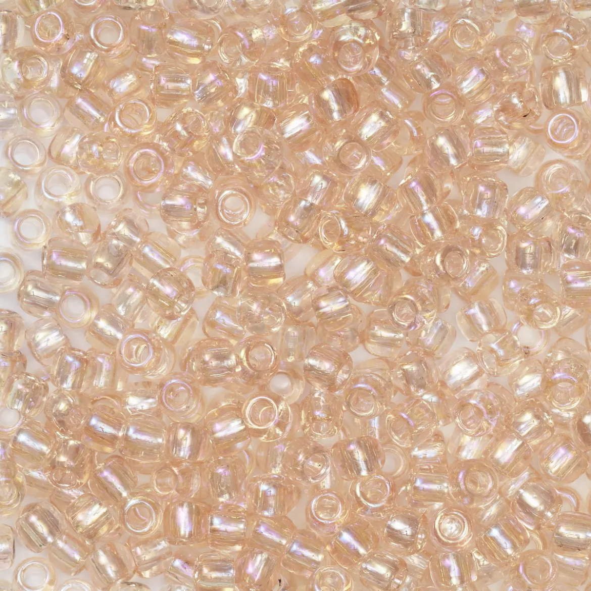 TOHO-perler runde 11/0 – lakserosa, 169 Transparent rainbow rosaline