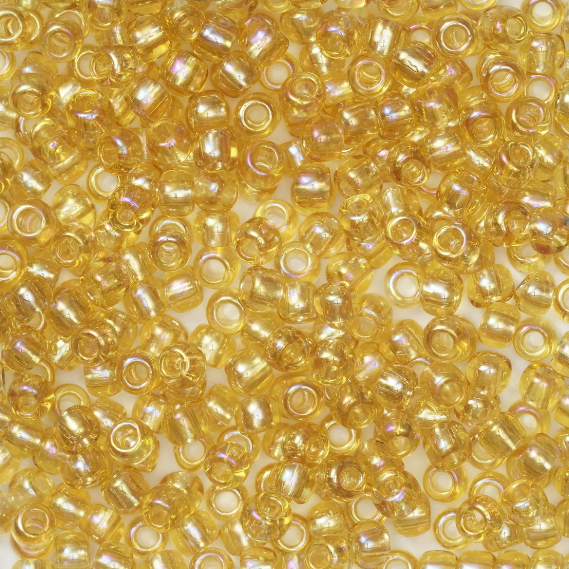 TOHO-perler runde 11/0 – ravgul, 162 Transparent rainbow light topaz