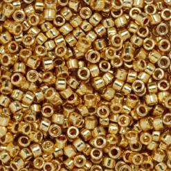 TOHO-perler 11/0 – gull metallic, PF557 PF galvanized starlight