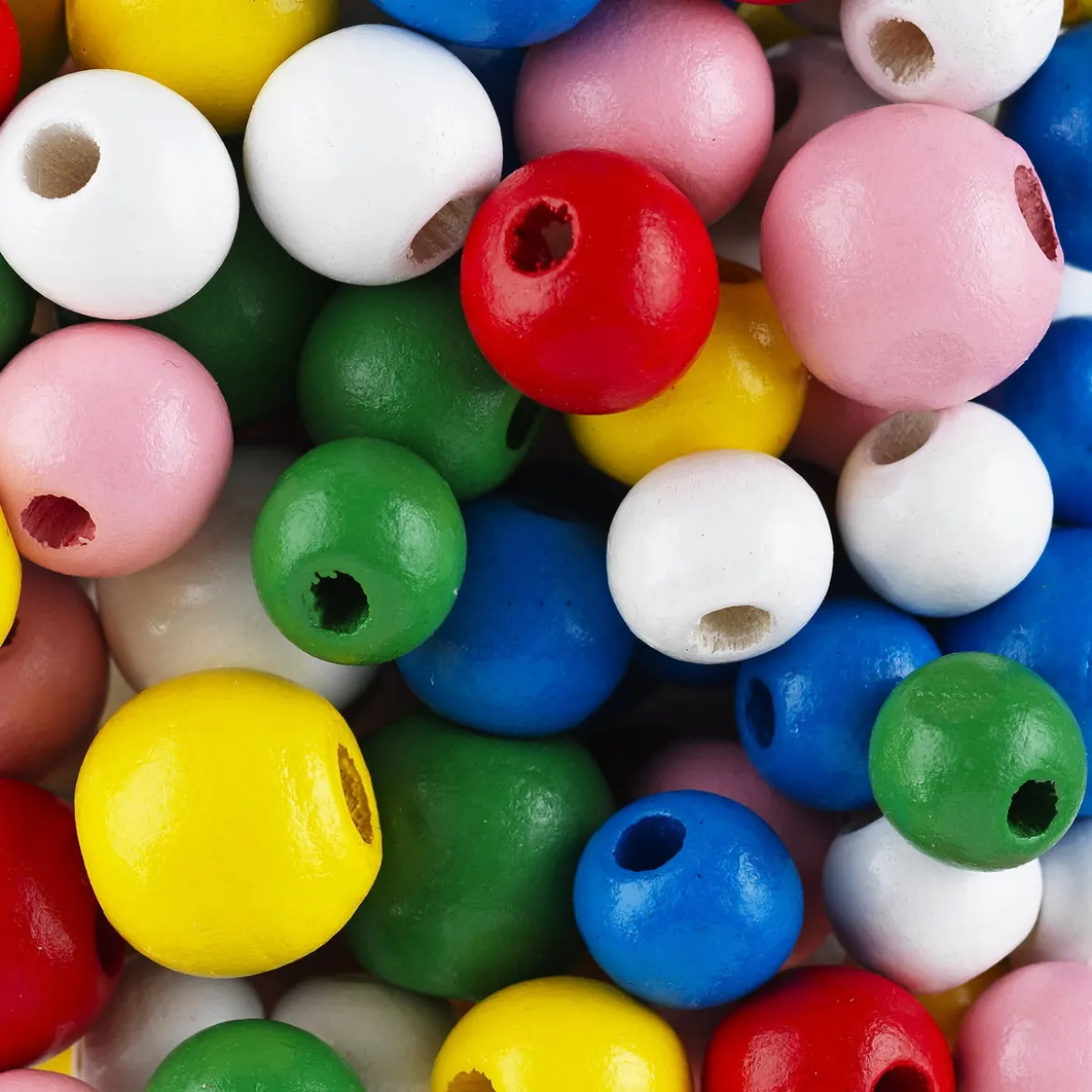 Treperler i en fargerik blanding, Ø10–14 mm. 80 gram, cirka 120–140 perler